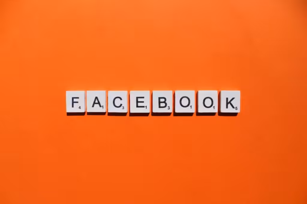 | 1 Facebook Scrabble Letters Word On A Orange Background